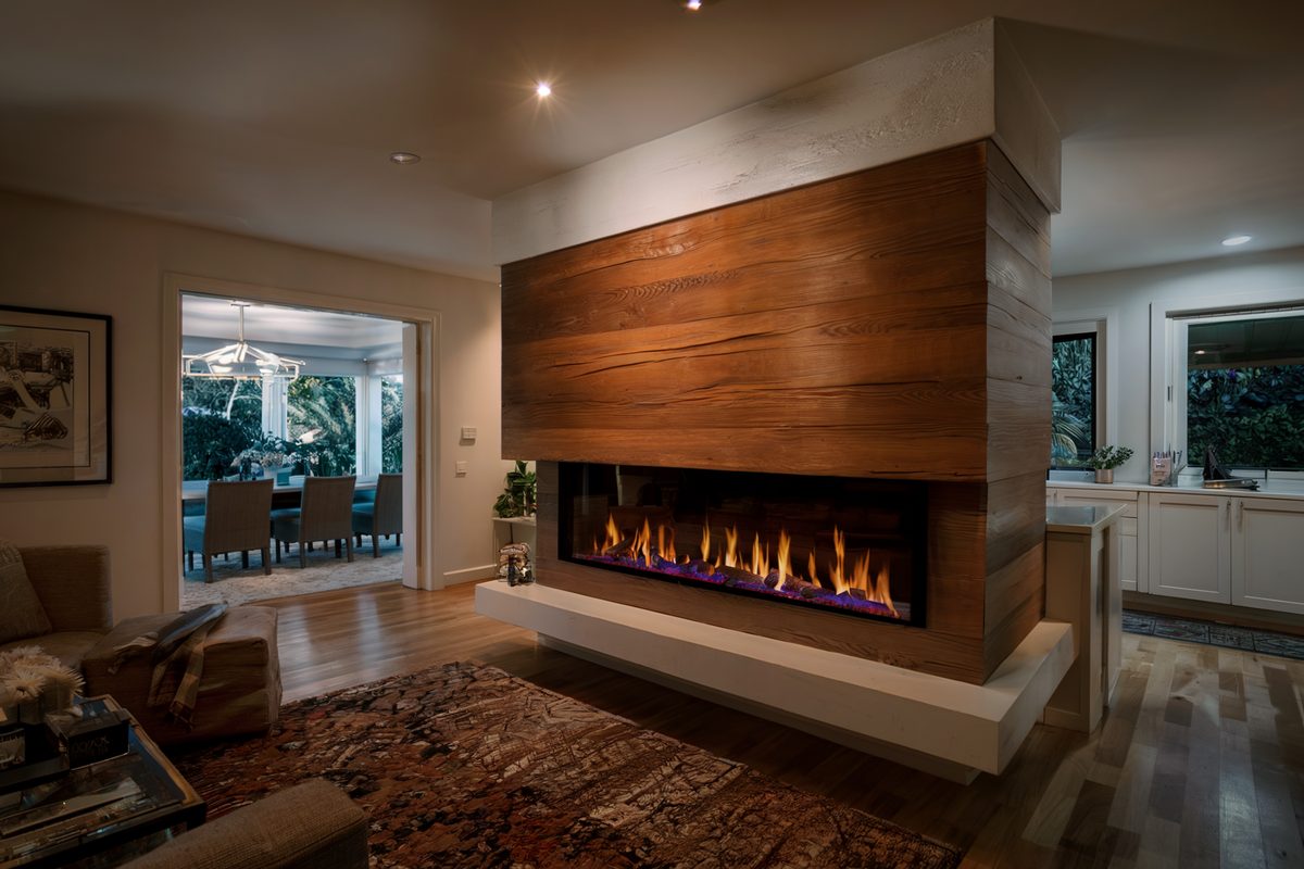 Custom wooden electric fireplace in a suburban home by Remodeling Beverly Hills