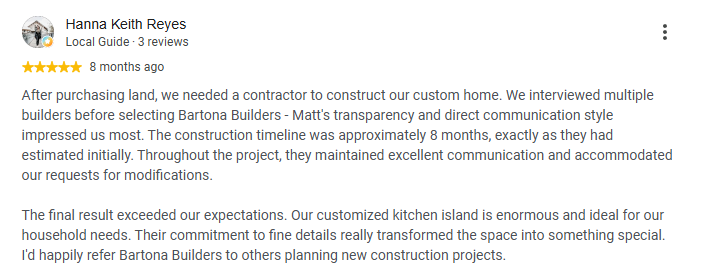 Five-star review of a custom home build praising the kitchen island and finish detail